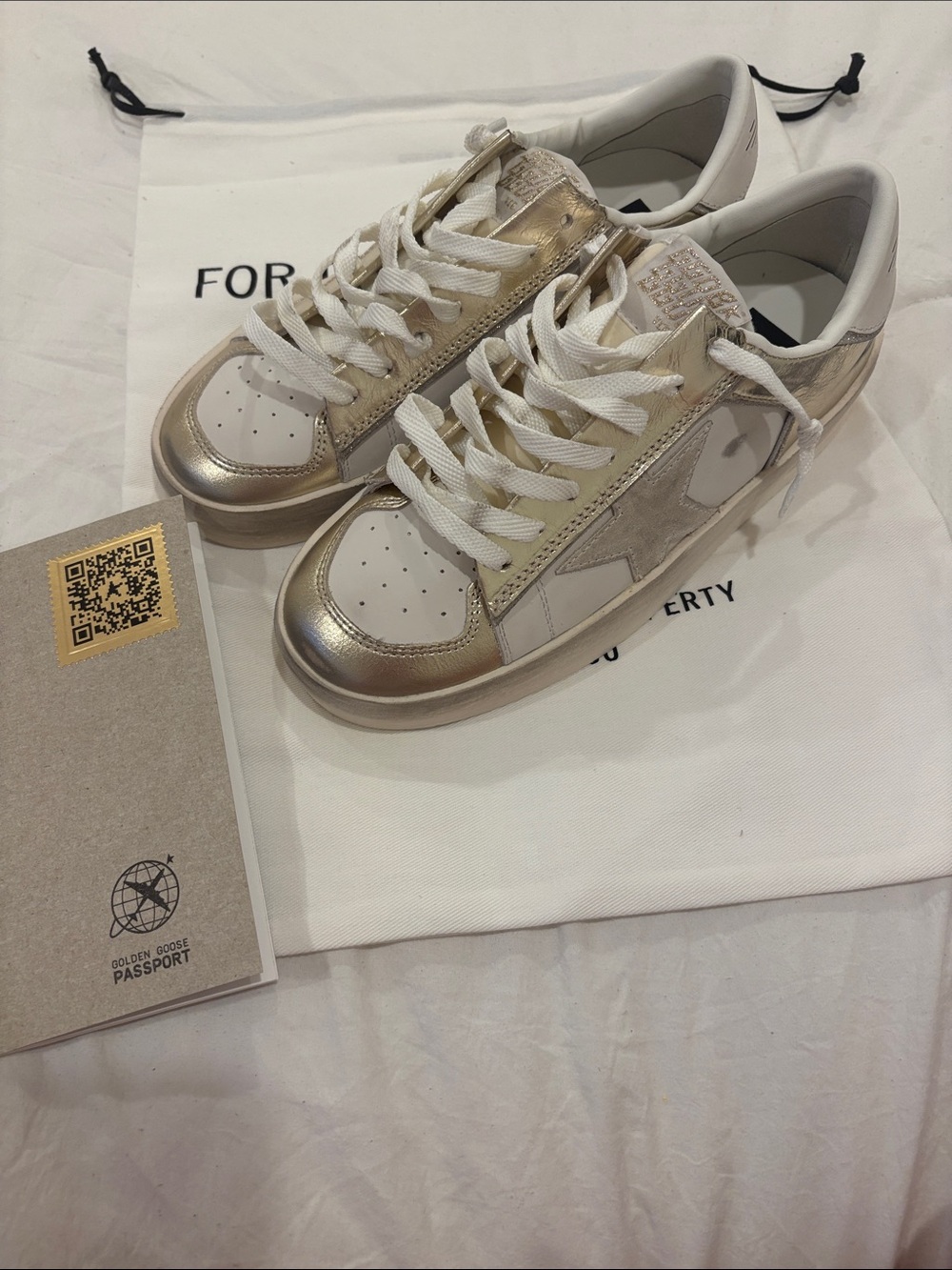 Golden Goose Women’s White Sneakers with Gold Metallic Accents